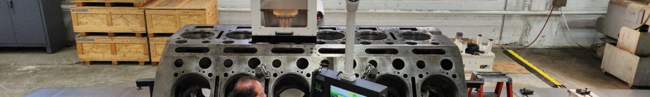 Large CNC Rottler machining center tooled for machining engine blocks.